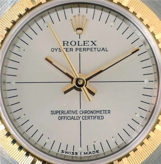 Rolex 76243 Yellow Gold & Steel on Oyster, Engine Turned Bezel Steel with Index